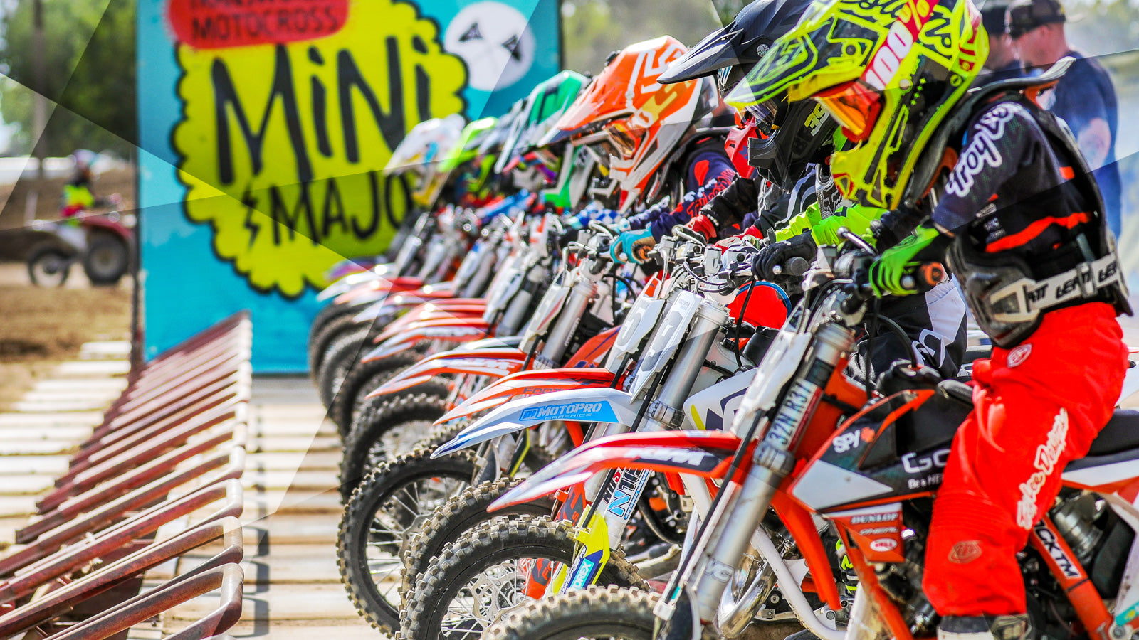 riders lined up at the start gate